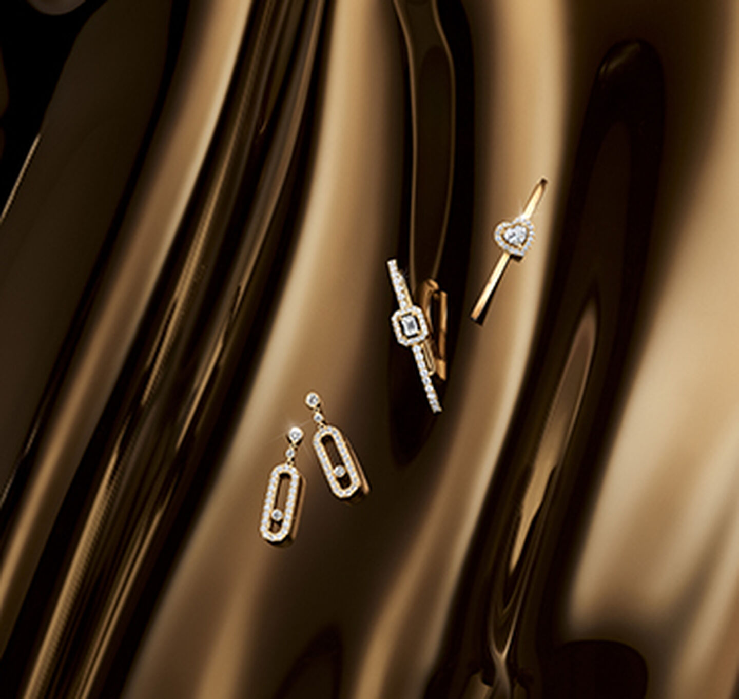 Messika diamond earrings on yellow background.